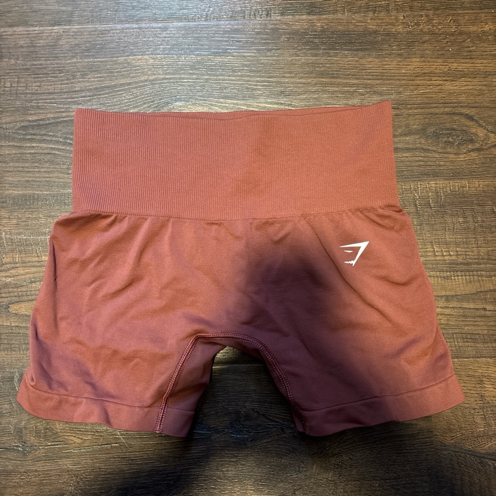 Red gym, shark shorts